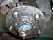 1983 Ford Bronco - Install the thick washer and set the inner nut by hand while rotating the hub. Then install the lock ring & the outer nut. The rotor should…