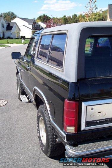 Black 1983 Ford Bronco, rear quarter view, grey top