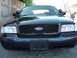 1999 Ford Crown Victoria - After the area behind the grille was painted black .