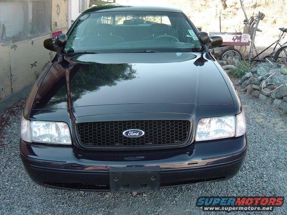 Black 1999 Ford Crown Victoria front end with honeycomb grille