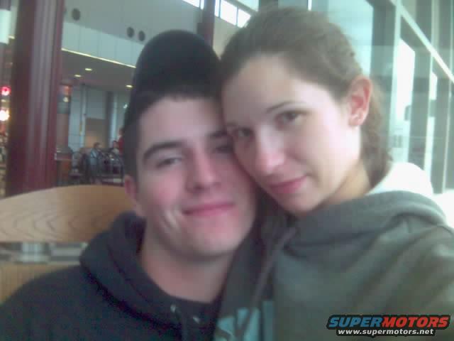 Couple posing for a selfie indoors