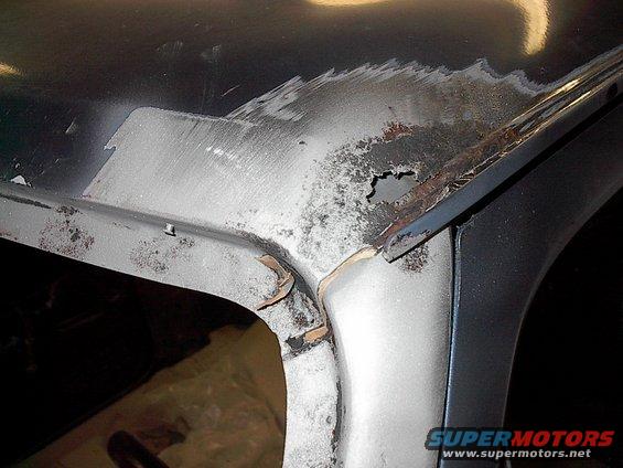 im001849.jpg This is the driver's pillar after sandblasting.  This metal was cut out then new metal was welded in.