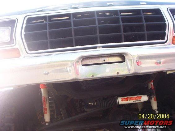 1978 Ford Bronco grille and chrome bumper with Trail Master suspension components visible underneath