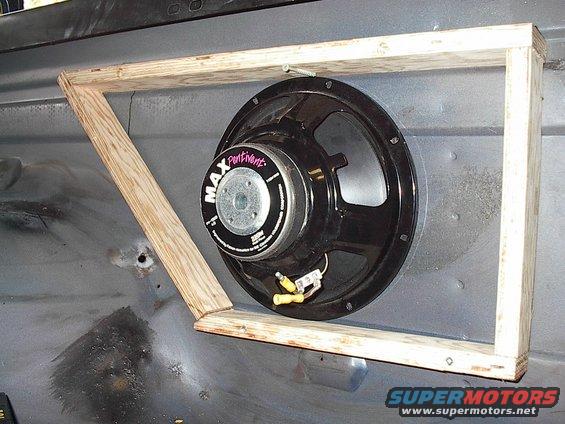 Position the speaker to get it into the best fit spot.  Maybe you can make out the 5 spot welds, to the right of the speaker.  Avoid those as they are part of the rear quarter bracing pillar (very, very thick, structural and hard to cut through).