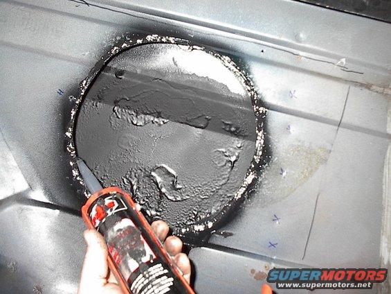 This ought to keep the water out, a nice bead of automotive seam sealer. Already sealed and undercoated the outside floor of the insert that will be sticking into the rear quarter, exposed to the elements.
