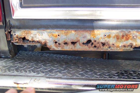 1986 Ford Bronco tailgate bottom with significant rust holes