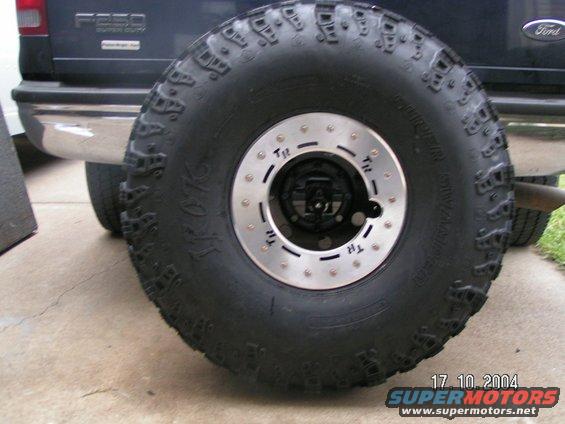Spare tire on black Ford F-250 Super Duty with chrome bumper