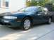 1995 Nissan 240SX - This 1995 Nissan 240SX is shown in a 3/4 front view, parked on a concrete driveway.