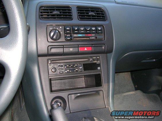 1995 Nissan 240SX interior dashboard with radio, climate controls, and steering wheel