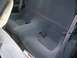 1995 Nissan 240SX - Interior view of gray fabric rear car seats with seat belts and a Kirkland box on the floor.