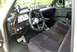 1991 Ford F-250 - Customized 1991 Ford F-250 interior features aftermarket gauges and a floor shifter.
