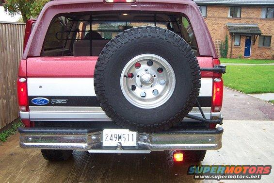 Rear fog light that is easily removed when 4x4ing.  Turn signals mounted to light cover and wired to front turn signals.