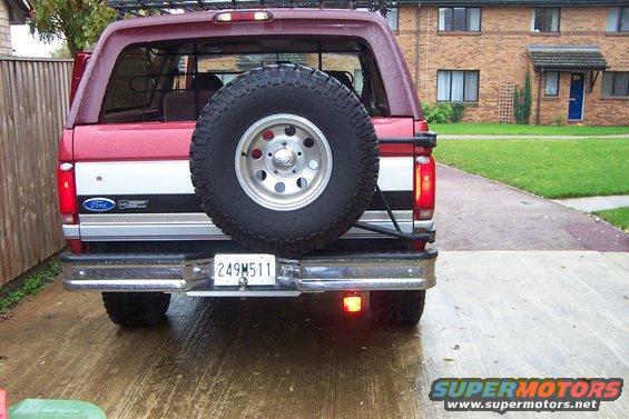 1996 Ford Bronco rear view with spare tire and license plate 249M511