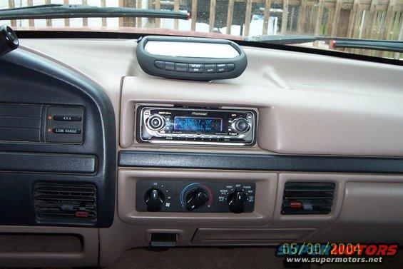 Car dashboard with Pioneer stereo, climate controls, and 4x4/Low Range buttons