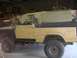1984 Ford Bronco - This Ford Bronco is in a garage, likely for restoration or repair work.