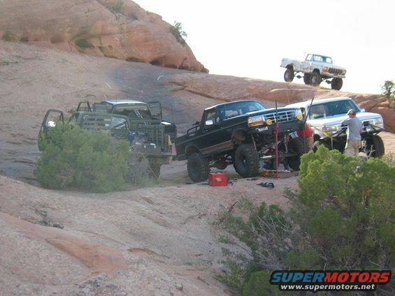 img_3134.jpg working to get scotts rig off the trail