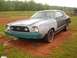 1977 Ford Mustang II - This 1977 Ford Mustang II shows signs of ongoing restoration, with a mix of primer and teal paint visible.