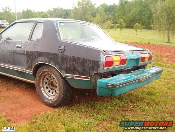 1977 Ford Mustang II rear view, bumper removed, in a grassy area