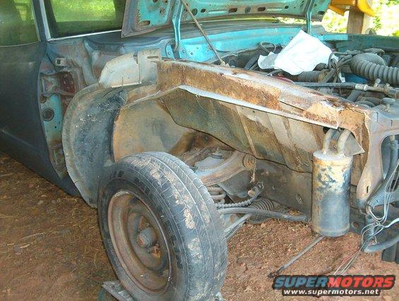 Front clip removed. Begin cleaning, stripping, repairing and painting everything in the fenderwells.