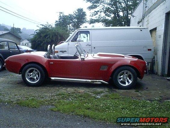 cobra-007.jpg Another car that I have no before shots of. When this car came It looked ok but the white stripes were peeling and the bottom 3 inches of the car was dry sprayed having hardly any paint on it!