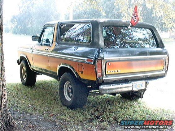 1979 Ford Bronco rear view with orange and black paint scheme