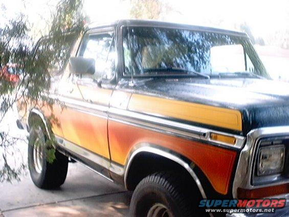 1978 Ford Bronco 3q-front view with orange and yellow side paneling