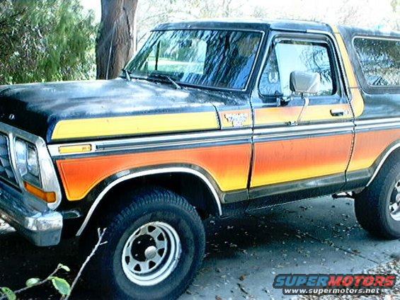 Ford Bronco with orange and yellow stripe graphics on the side