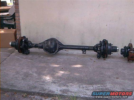 Ford rear axle assembly with disc brakes and differential housing