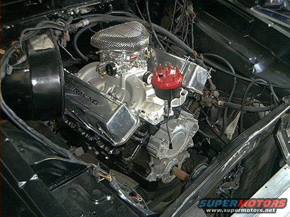 Chrome engine with air filter and red distributor cap