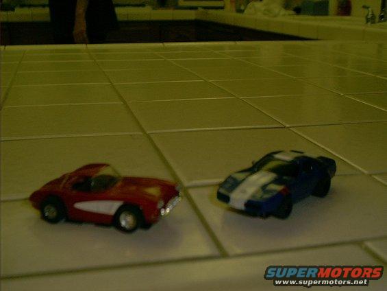 im000171.jpg two cars and slot car track I will sell 
