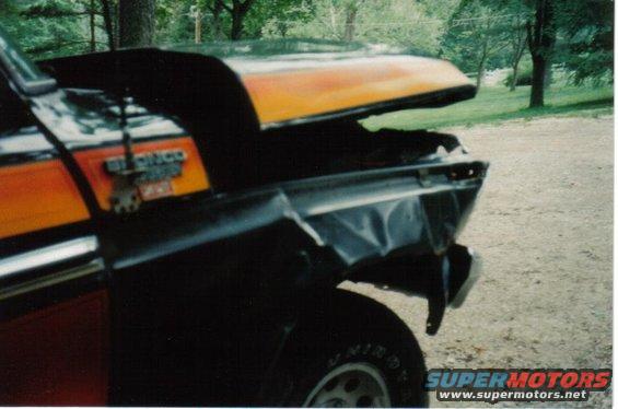 Front fender and hood of a 1979 Ford Bronco are crumpled