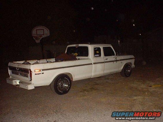 White Ford F-Series SuperCab pickup truck, likely 1977 model year