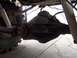 2000 Ford F-450 - The photo shows the underside of a vehicle, focusing on the rear axle assembly and suspension components.