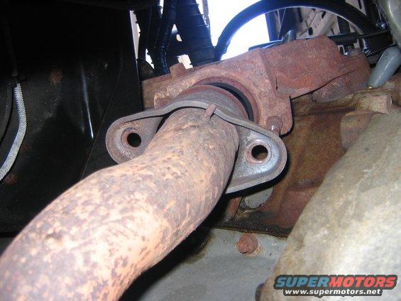 img_1165.jpg The, with lots of heat I removed t he nuts holding the crossover pipes on the exhaust manifolds.