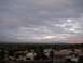 1990 Ford Bronco - A wide view of a suburban neighborhood under a cloudy sky, with a watermark at the bottom right.