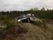1983 Ford Ranger - A dark green pickup truck navigates an off-road trail on a cloudy day.