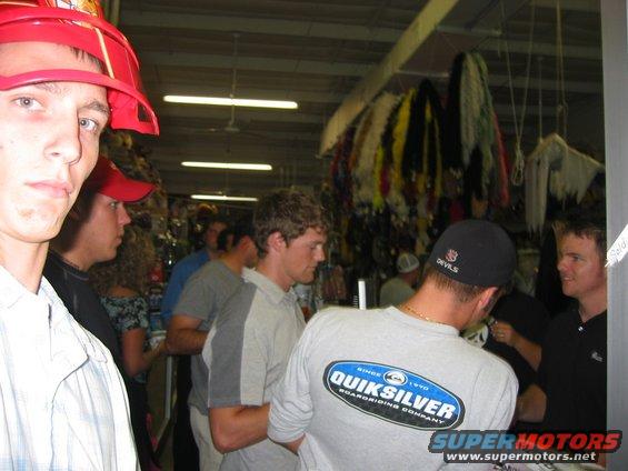 img_0198.jpg So when I saw this fireman hat I had to get it for my roomate, who's going as a fireman. There is the webmaster of the costume shop on the right...he says he's gonna put our costume aquisition story on the website...we'll see.
