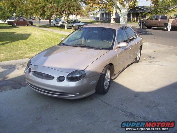 Tan 1998 Mercury Sable sedan, 3/4 front view
