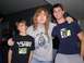 1990 Ford Bronco - Dave Mustaine poses with two younger individuals, one wearing a Volcom t-shirt.
