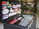 1978 Ford Bronco - A black tool chest is open, displaying rows of sockets and various racing-themed stickers on its lid.