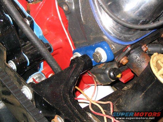 Blue motor mount on red engine block