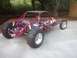 1978 Ford Bronco - This custom dune buggy features a tubular frame, large rear sand tires, and a visible engine assembly.