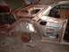 1971 Ford Torino - This vehicle is undergoing extensive bodywork, with much of its interior and exterior panels removed.