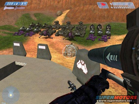 Video game scene with rows of alien tanks and smaller purple vehicles, viewed from first-person perspective