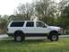 2004 Ford Excursion - 5.5" Fabtech. 37x12.5x17 BFG All Terrain. 17x9 Helo Maxx 8 Chrome rims.