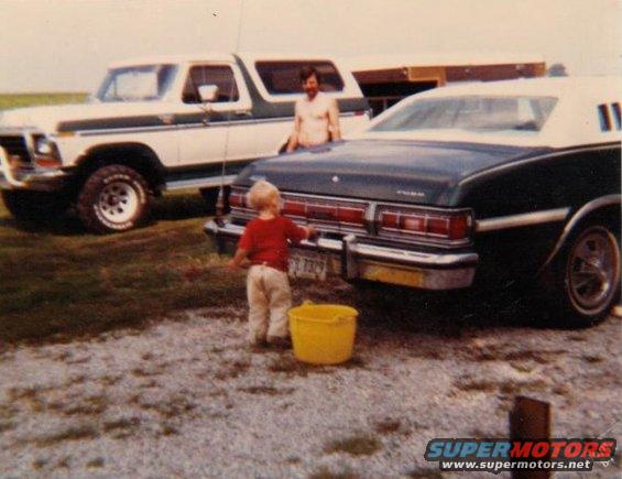 bronco5.jpg Thats me washing the Grand Turino, I was 2 years old