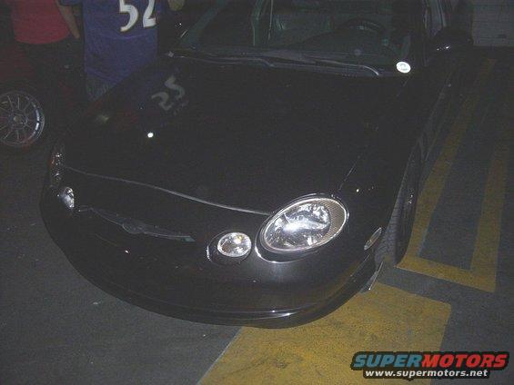 Black 1998 Mercury Sable front end with oval headlights and fog lights