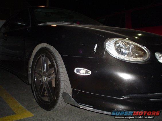 1998 Mercury Sable front corner with custom wheels and aftermarket front splitter