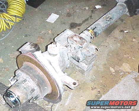 Front axle assembly with brake rotor and hub