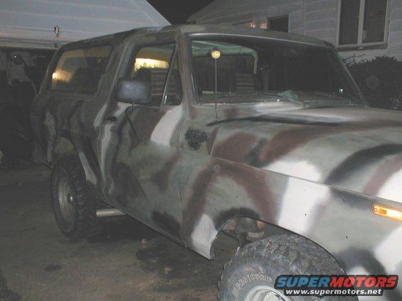 Camouflaged 1979 Ford Bronco, 3/4 front view